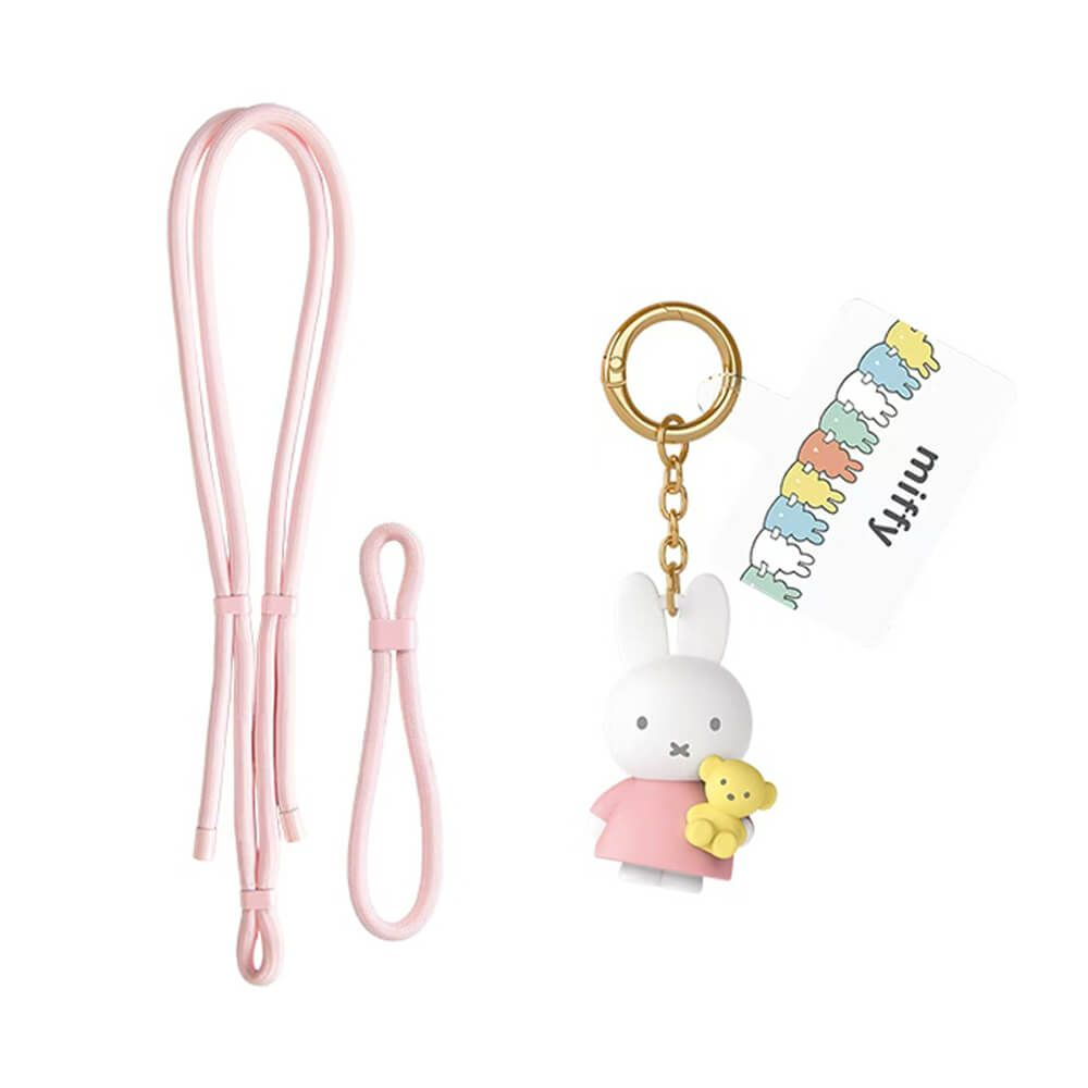 A Miffy keychain set featuring a white rabbit character holding a yellow teddy bear, a gold key ring, a pink strap, and a small branded tag on a plain white background.