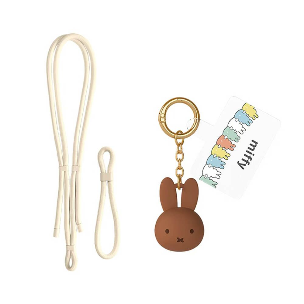 A Miffy keychain accessory set on a white background, featuring a brown bunny face charm with a gold key ring and chain, a cream-colored strap, and a white tag with the Miffy logo.