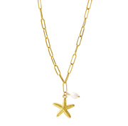 Gold necklace with a starfish pendant on a white background