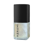 A bottle of Hanami nail polish with a black cap and a clear glass base showing a shimmering, iridescent champagne-gold polish inside, isolated on a white background.