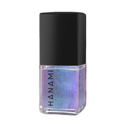 A bottle of Hanami nail polish with a black cap and a clear glass base showing a shimmering, iridescent blue-purple color.