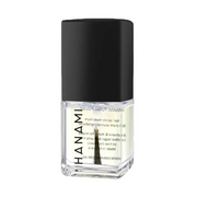 A bottle of Hanami Nail Polish in a clear glass container showing a pale yellow liquid, topped with a matte black cap, on a plain white background.