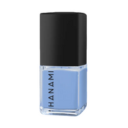 Lavender nail polish bottle with black cap on a white background