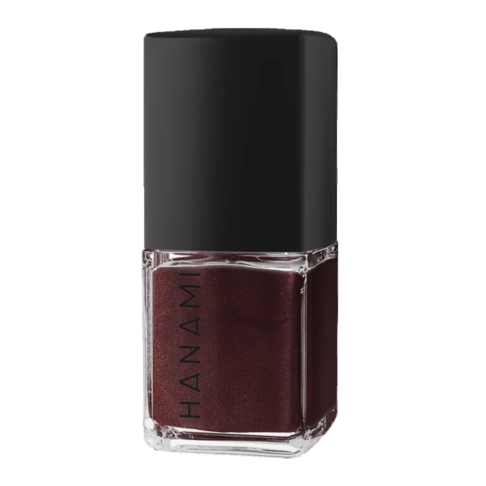 A bottle of Hanami nail polish in a deep, shimmering burgundy red shade, featuring a matte black cap and a clear glass base, set against a plain white background.