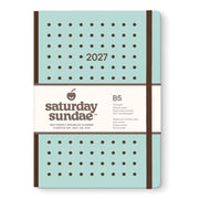 A Saturday Sundae 2027 B5 Weekly Spinkles Planner with a mint green cover, brown polka dot pattern, and a white paper band around the middle.