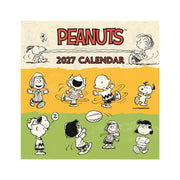 Peanuts 2027 calendar cover with cartoon characters on a yellow and green background