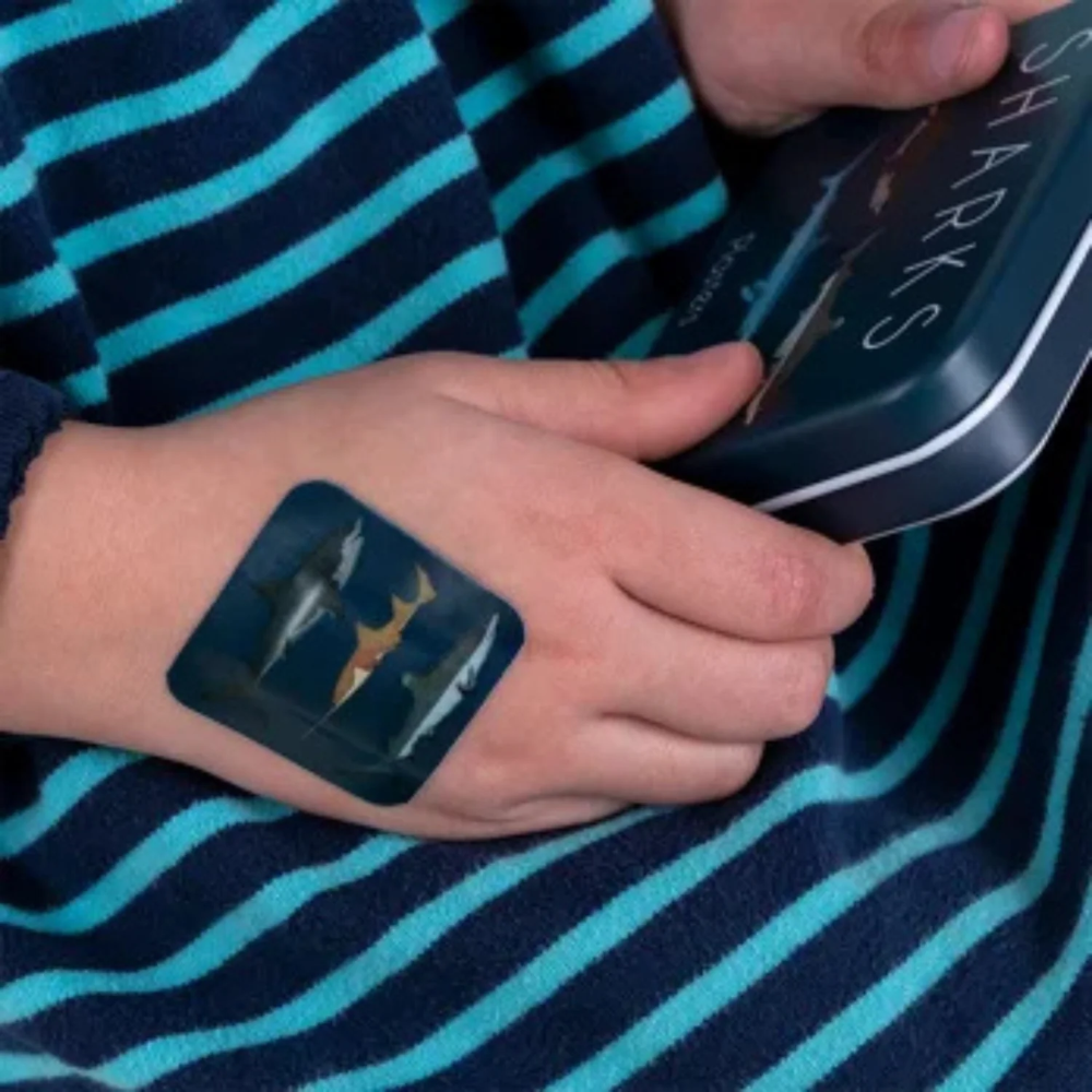 Person wearing a temporary shark tattoo 