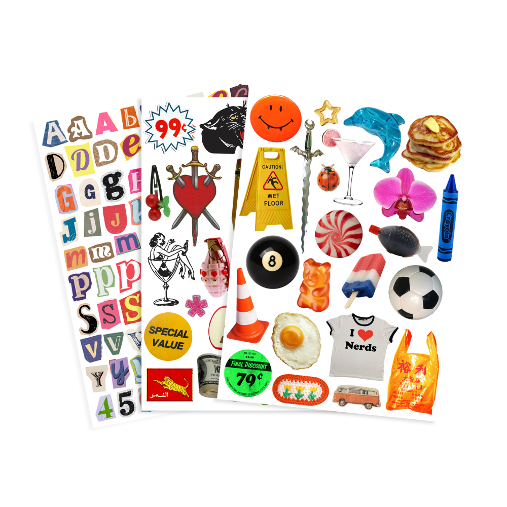Three sheets of colorful novelty stickers displayed on a clean white background. The stickers feature a wide variety of designs including alphabet letters, a warning sign, a black cat, cherries, a sword, a martini glass, pancakes, an orchid, a gummy bear, a soccer ball, and other cartoon and pop-culture themed graphics.