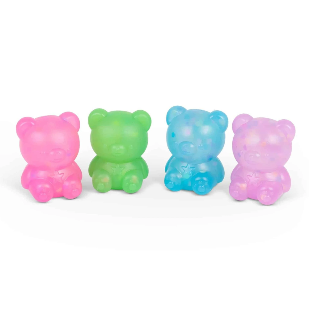 Four colorful gummy bear toys on a white background