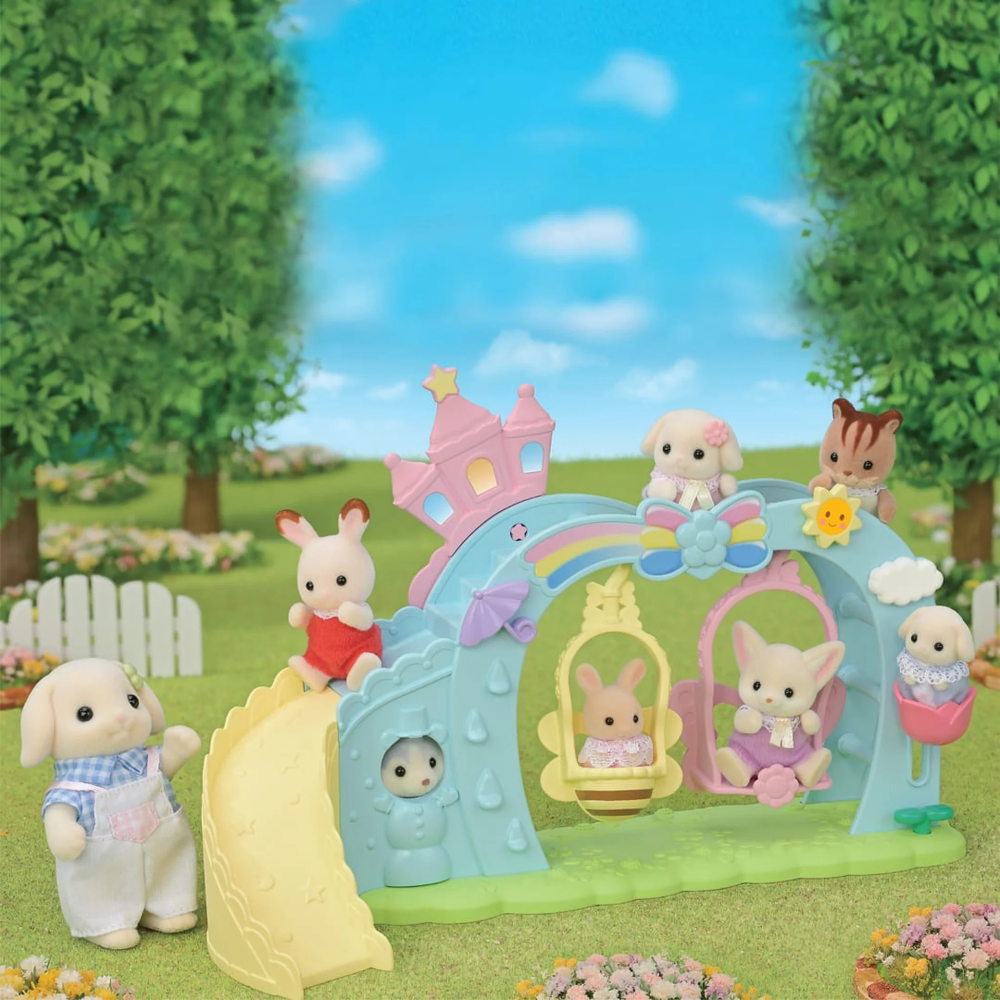 Toy set with animal figures around a colorful playground structure in a garden setting.