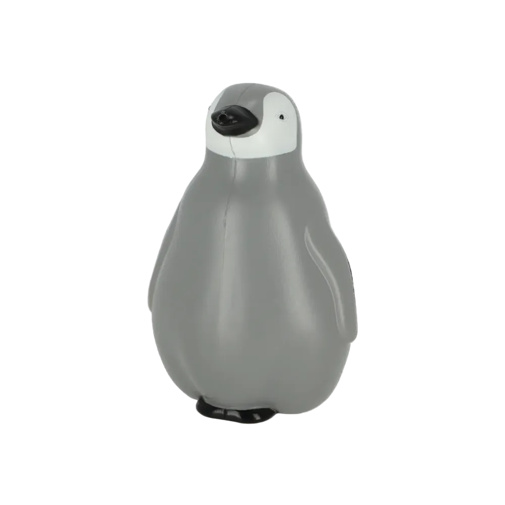 A gray penguin toy or figurine with a white chest, black beak and feet, photographed on a plain white background.