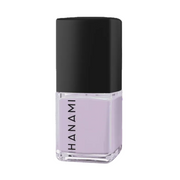 Lavender nail polish bottle with black cap on a white background