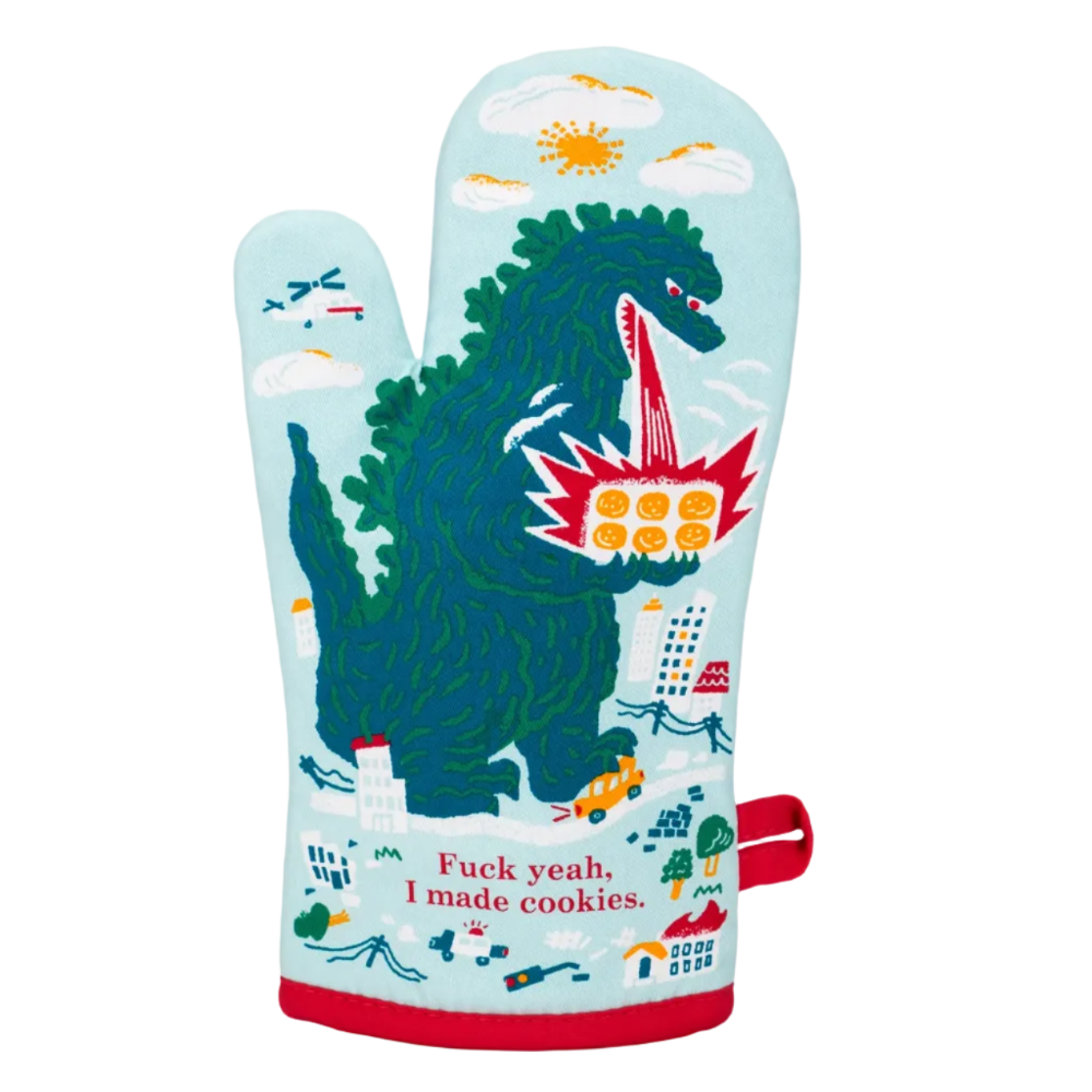 Oven mitt with Godzilla design and text 'Fuck yeah, I made cookies.' on a light blue background
