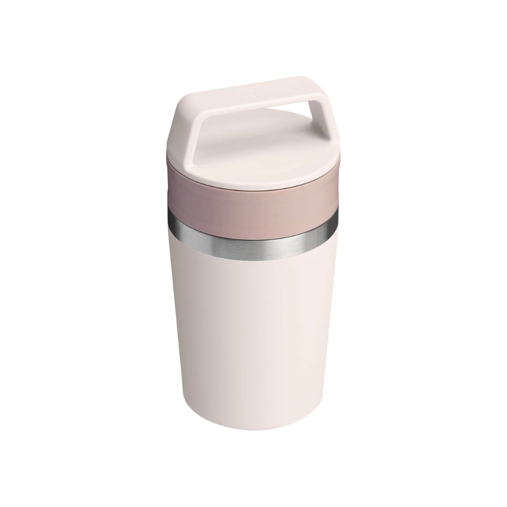 A light pink insulated container with a matching lid featuring an integrated handle, a dusty pink band, and a thin silver metallic accent ring, shown on a plain white background.
