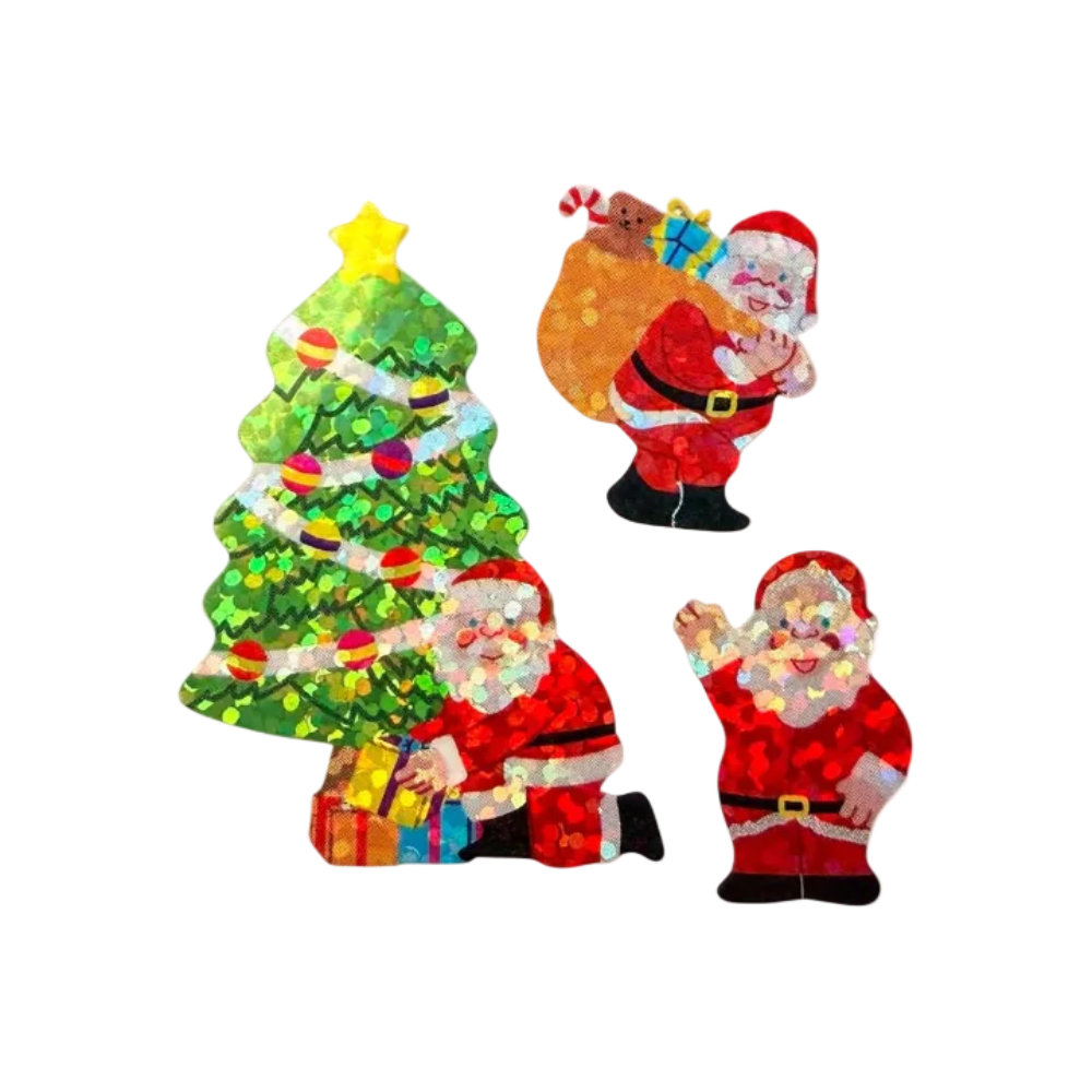 Three festive Christmas cutout decorations featuring Santa Claus, one standing, one kneeling by gifts, and one carrying a sack with a teddy bear and presents, all on a plain white background.