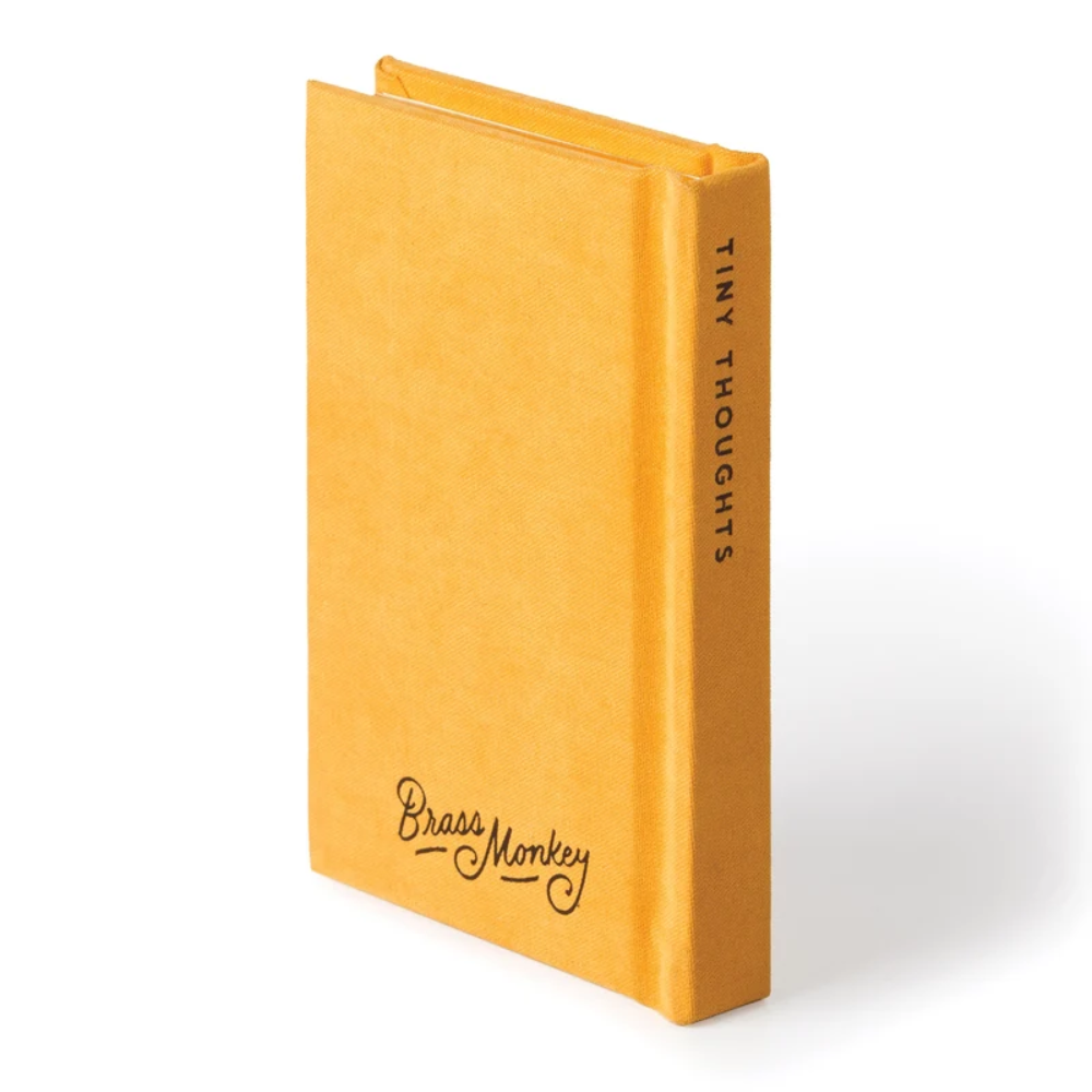 Yellow notebook with 'Brass Monkey' branding on a white background