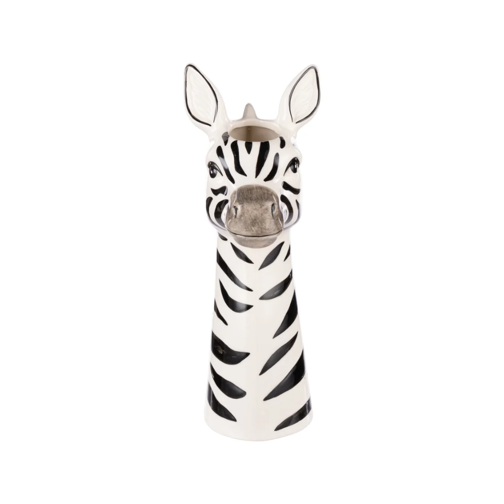 A zebra-shaped ceramic bottle opener on a solid white background.