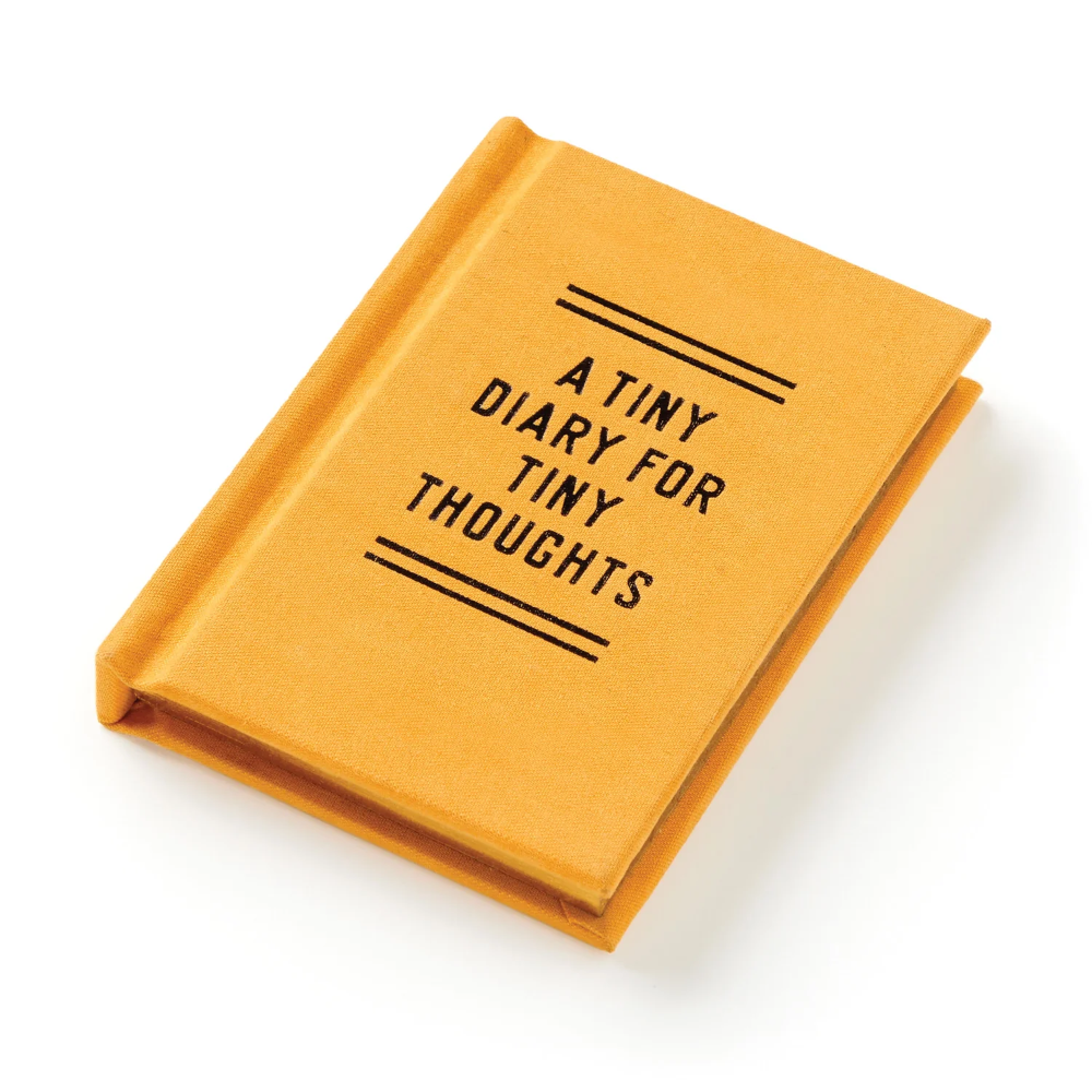 Yellow diary with 'A Tiny Diary for Tiny Thoughts' text on a white background