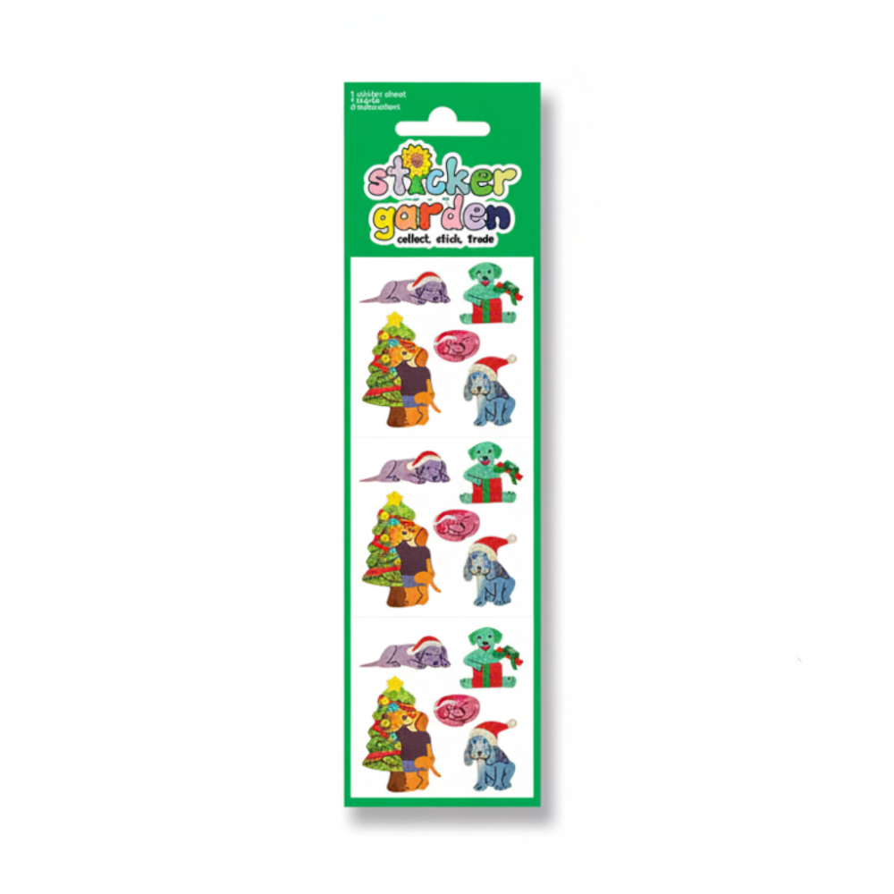 Sticker sheet and loose Christmas-themed dog stickers from Sticker Garden. The sheet shows multiple colorful dog illustrations with Santa hats, gifts, and a Christmas tree, alongside several loose cut-out stickers on a white background.