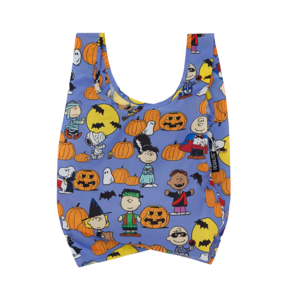 A reusable plastic bag with a blue base printed with a colorful Halloween-themed Peanuts character pattern, including pumpkins, ghosts, and characters in costumes, shown against a light gray background.