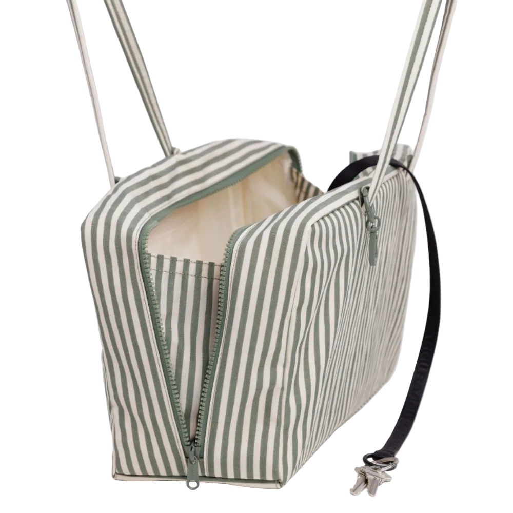 Baggu Green and white striped bag with a black strap on a white background