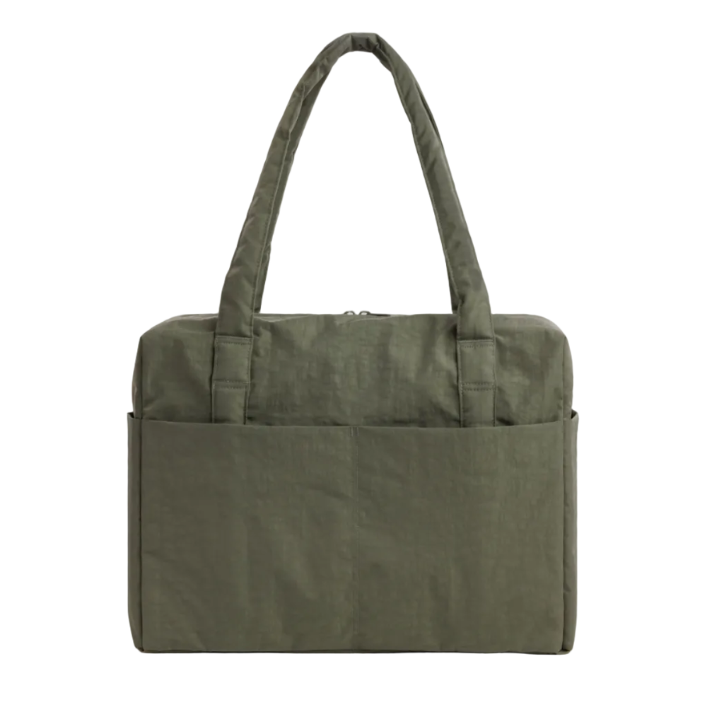 An olive green linen tote bag with dual top handles and a front slip pocket, shown against a light gray background.