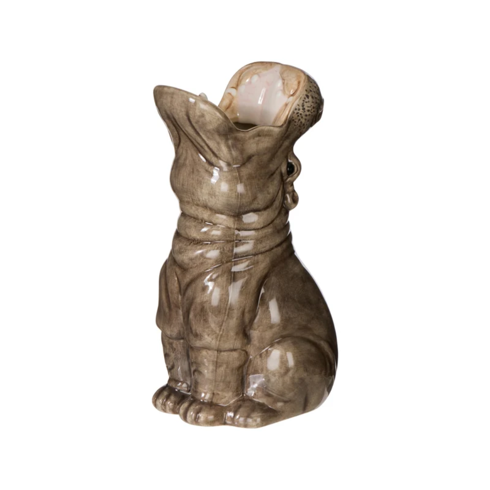 A ceramic dog figurine with its mouth wide open, acting as a cup or planter, featuring a glossy brown and beige glaze on a plain white background.