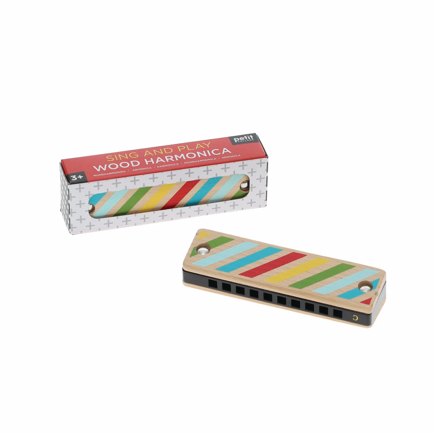 Colorful wooden harmonica with packaging on a white background
