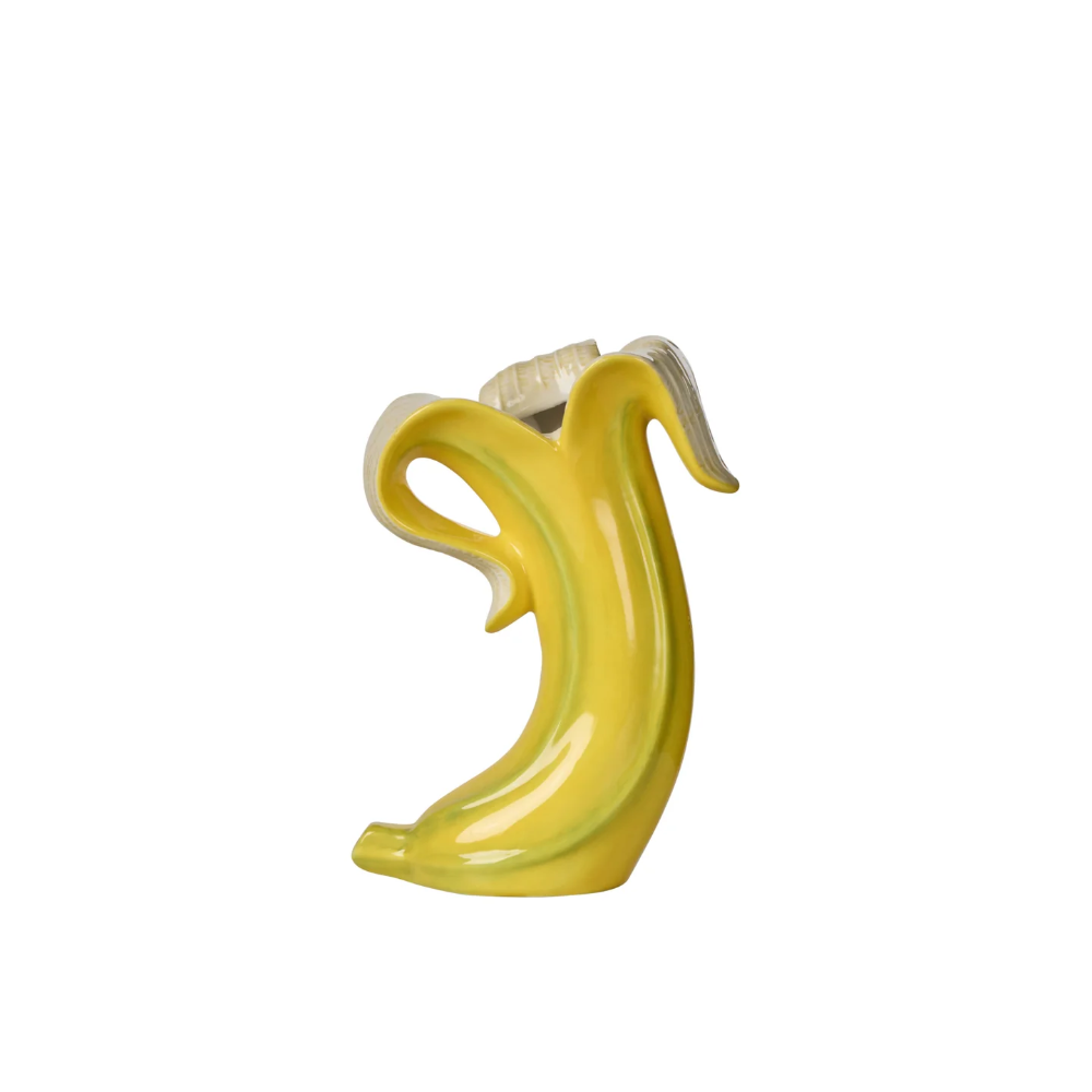 Yellow banana-shaped object on a white background