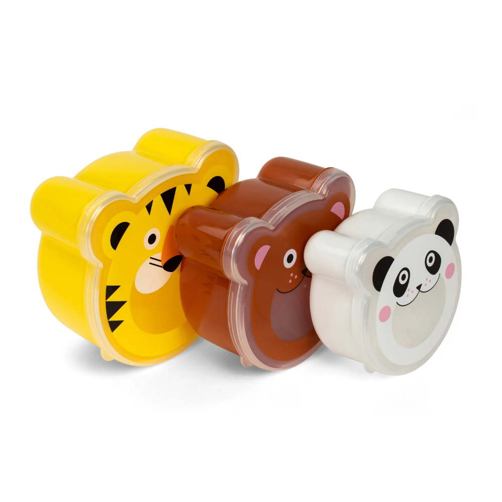 Three animal-themed lunch boxes shaped like a lion, bear, and panda on a white background.