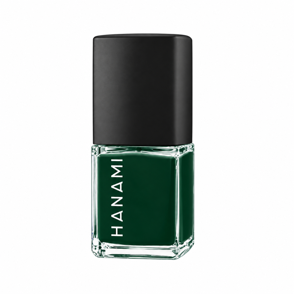 A bottle of Hanami nail polish in a deep forest green shade, housed in a clear glass bottle with a matte black cap, shown against a plain white background.