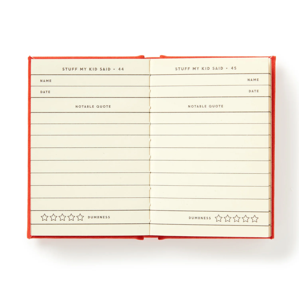 Open notebook with lined pages and text on a white background
