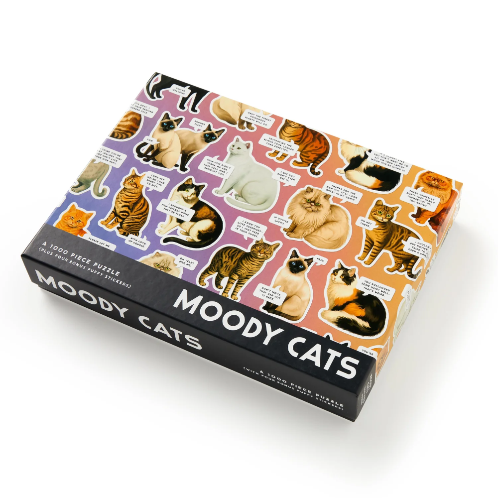 Box of 'Moody Cats' puzzle with cat illustrations on a white background