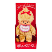 Monchhichi plush toy with a red bow in a red box on a white background