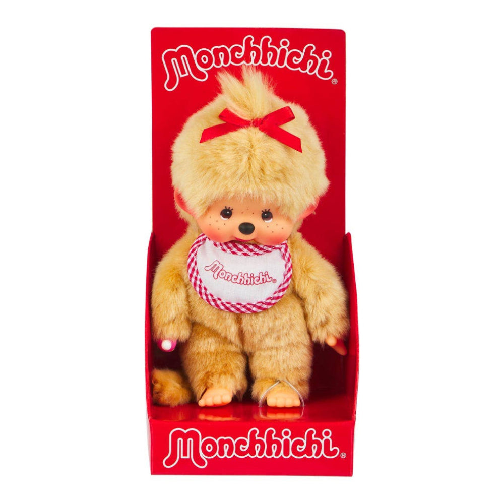 Monchhichi plush toy with a red bow in a red box on a white background