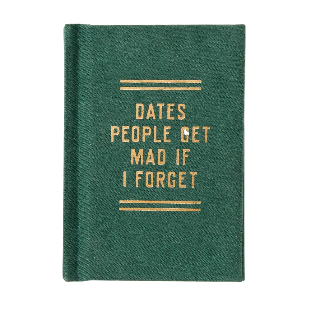 Green notebook with gold text on a white background