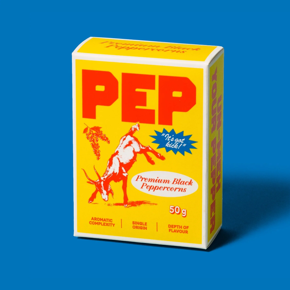 Box of Pep Premium Black Peppercorns on a blue background