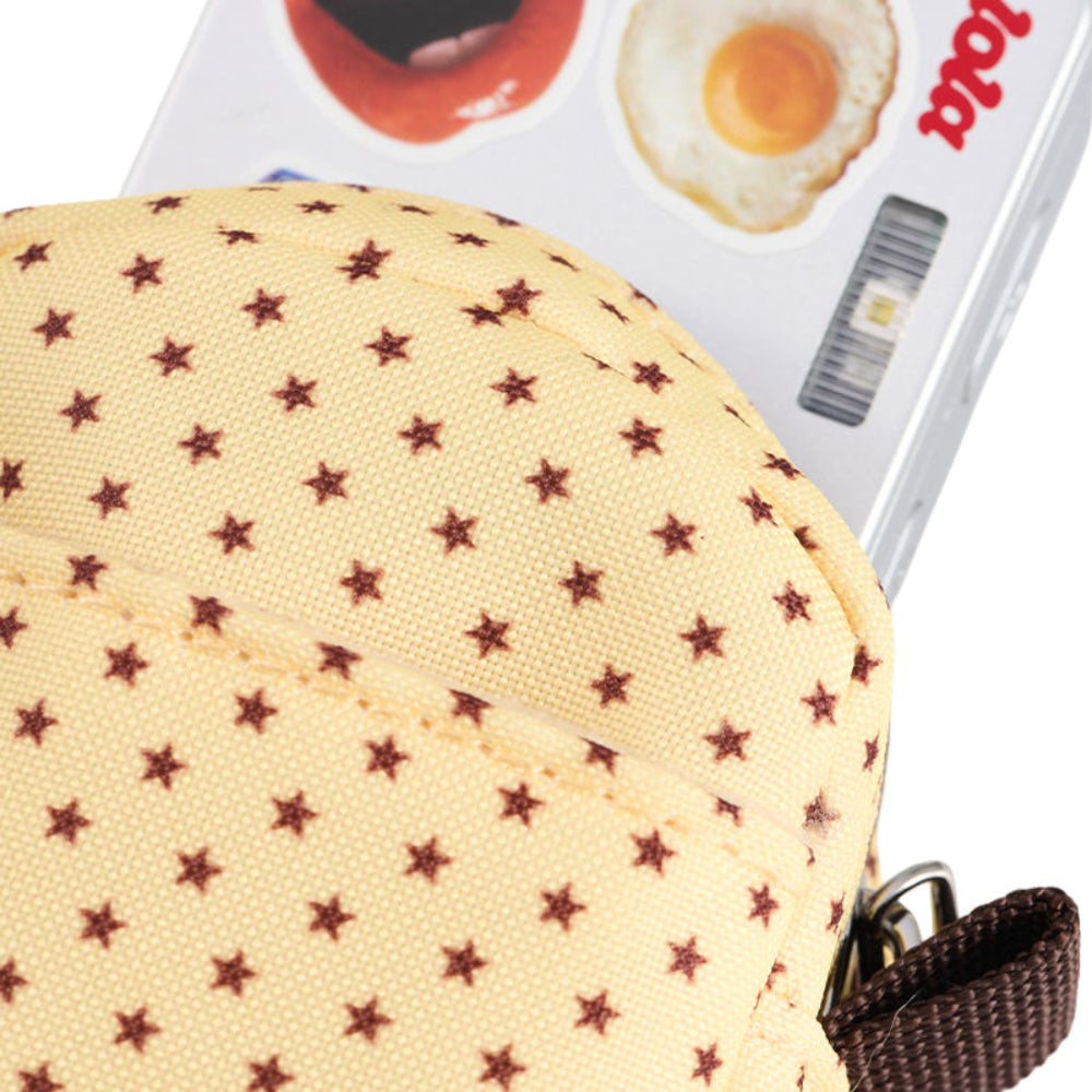 Yellow pouch with star pattern on a white background