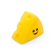 Yellow cheese-shaped object with a smiley face on a white background