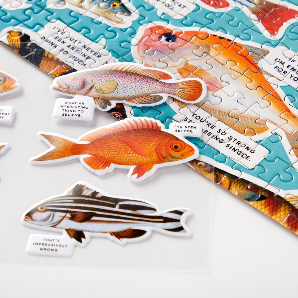Jigsaw puzzle with fish illustrations and text on a white background