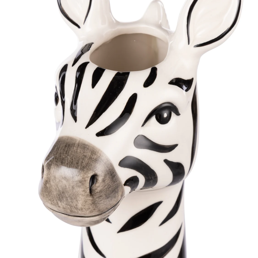 Ceramic zebra head on a white background