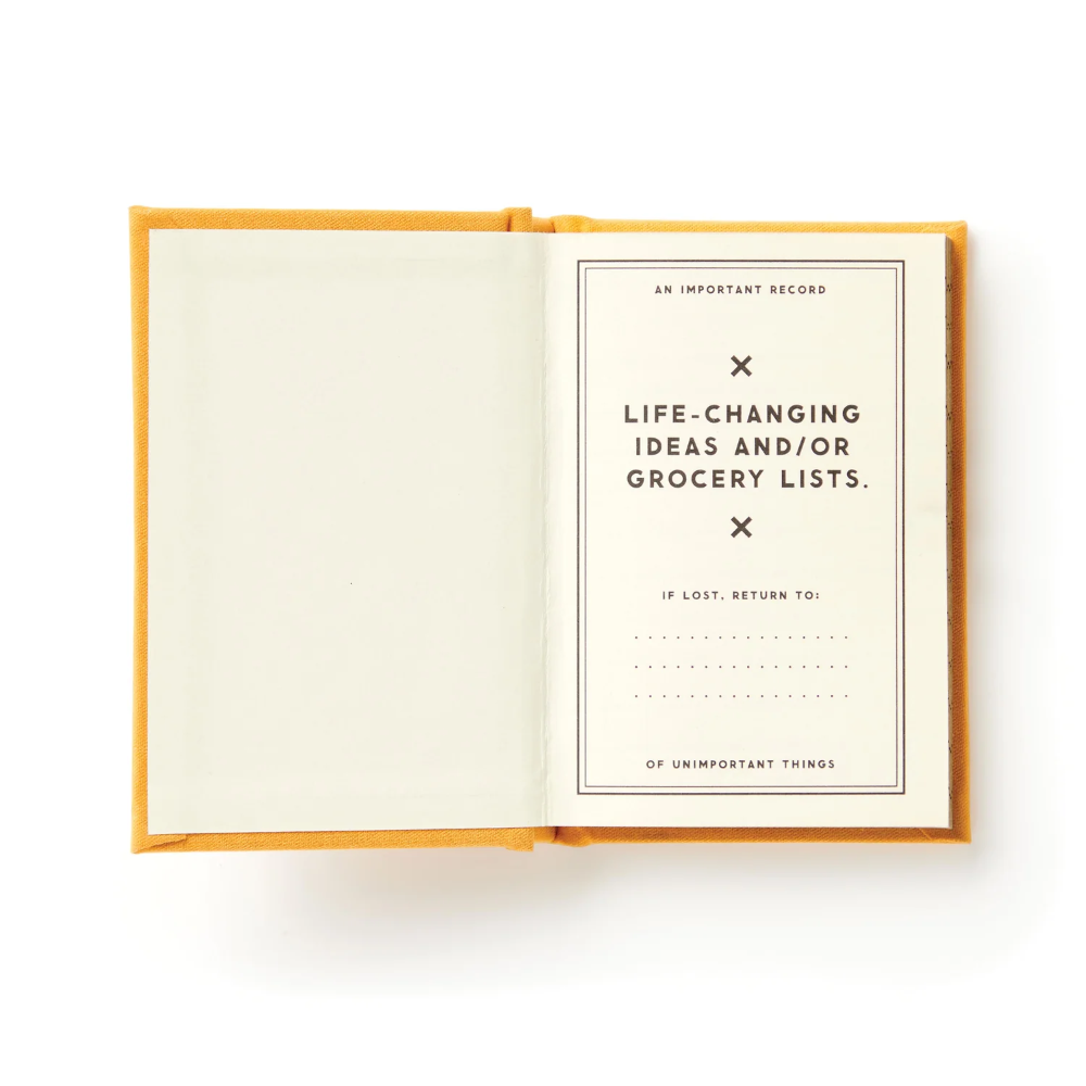Open notebook with a title page on a white background