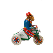 Tin Monkey on Bike